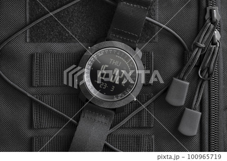 Tactical watch on backpack 100965719