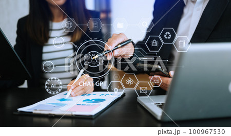 Man and woman using chatbot in computer and tablet  smart intelligence Ai.Chat GPT Chat with AI Artificial Intelligence, developed by OpenAI generate. Futuristic technology, robot in online system. 100967530