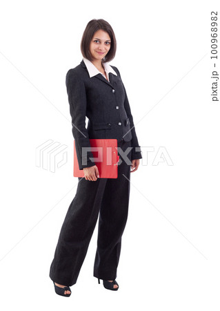 Young business woman holding a clipboard Young business woman holding a clipboard 100968982