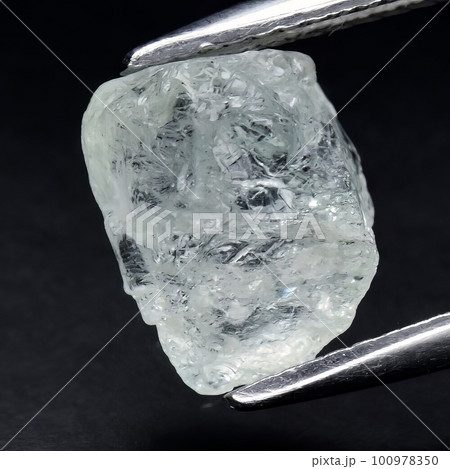 Natural gemstone green beryl on black background 100978350