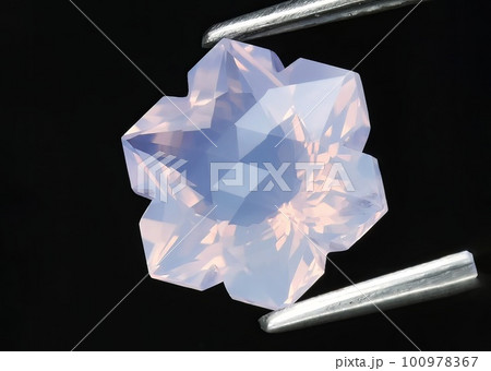 Natural gemstone purple amethyst on gray background 100978367