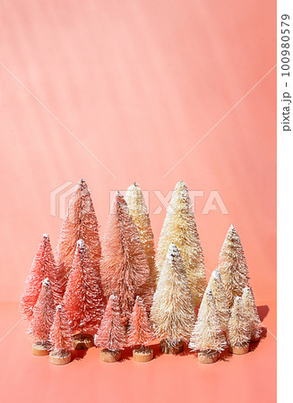 Bottle brush trees composition for winter holidays. Miniature artificial Christmas trees collection. Bottle brush trees composition for winter holidays. Miniature artificial Christmas trees collection. 100980579