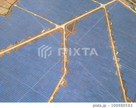 Solar cell panels at solar farm, drone view. Green energy concept. 100980583