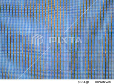 Solar cell panels at solar farm, drone view. Green energy concept. Solar cell panels at solar farm, drone view. Green energy concept. 100980586
