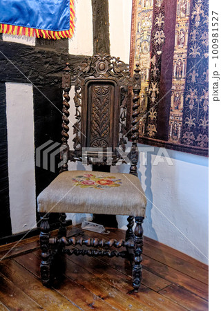 Old vintage chair at Tudor House Museum Worcester - United Kingdom Old vintage chair at Tudor House Museum Worcester - United Kingdom 100981527