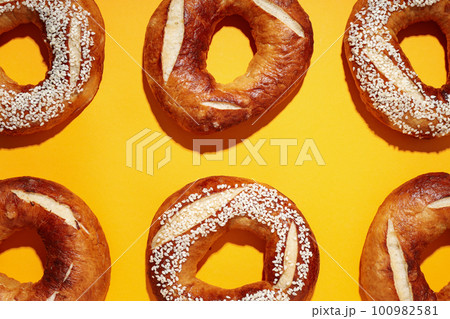 Concept of tasty food - bagel, top view Concept of tasty food - bagel, top view 100982581