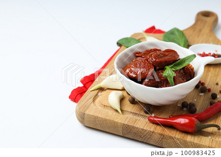 Concept of tasty food - sun-dried tomato, space for text 100983425