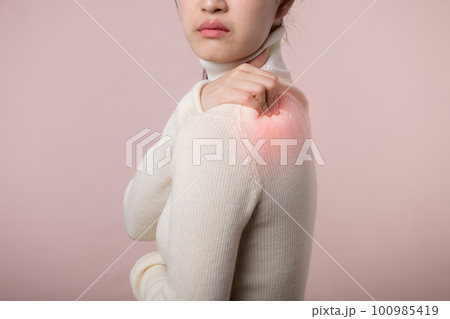 Asian young woman hold her hand on pain neck and injury ache shoulder stress problem muscle. Office syndrome disease, Health care world health day concept. Asian young woman hold her hand on pain neck and injury ache shoulder stress problem muscle. Office syndrome disease, Health care world health day concept. 100985419