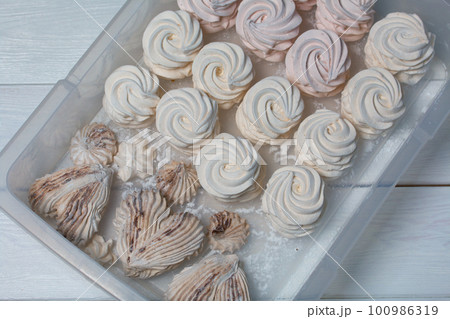 Marshmallows on trays. Homemade zephyr. Close-up. Marshmallows on trays. Homemade zephyr. Close-up. 100986319