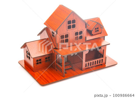small model of an apartment building on a white background 100986664