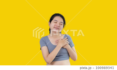 Asian woman smiling happily isolated on white background, Woman loves and rejoices herself, Contented, Pure love, Love myself, Proud of yourself, Self-made happiness, Optimism, Painting Therapy with a Asian woman smiling happily isolated on white background, Woman loves and rejoices herself, Contented, Pure love, Love myself, Proud of yourself, Self-made happiness, Optimism, Painting Therapy with a 100989341