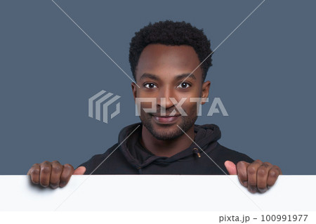 businessman advertising showing blank signboard over page holding white copy space board businessman advertising showing blank signboard over page holding white copy space board 100991977