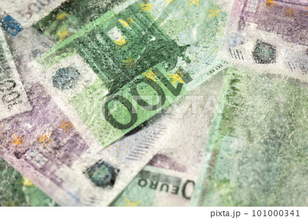 One hundred and five hundred euros are defrosted in ice. The European cash currency is frozen. One hundred and five hundred euros are defrosted in ice. The European cash currency is frozen. 101000341