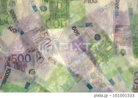 Blurred photo of one hundred and five hundred euros are defrosted in ice. The European cash currency is frozen. 101001533
