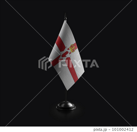 Small national flag of the Northern Ireland on a black background 101002412