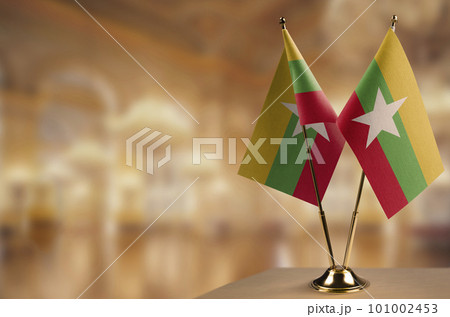 Small flags of the Myanmar on an abstract blurry background Small flags of the Myanmar on an abstract blurry background 101002453