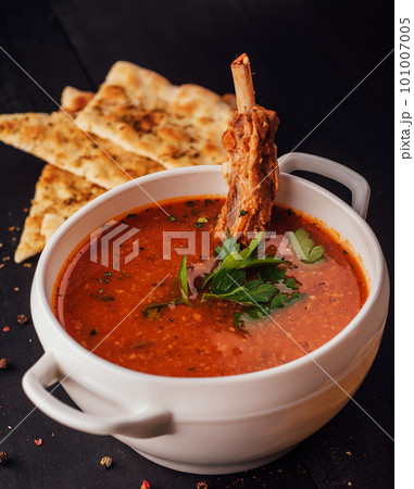 Claypot of spare rib soup on white bowl 101007005