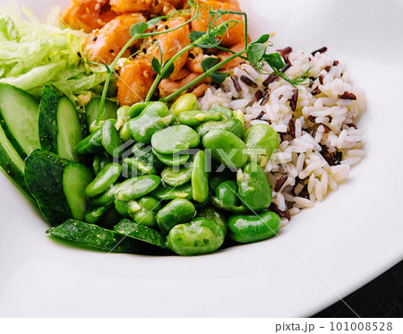 Hawaiian salmon poke salad with rice closeup Hawaiian salmon poke salad with rice closeup 101008528