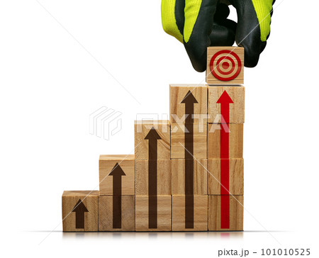 Gloved Hand Arranging Wood Blocks as Step Stair and Target Symbol 101010525