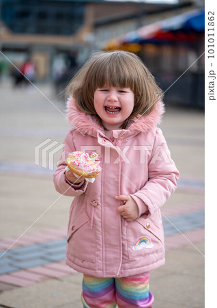 Crying toddler baby girl, outside portrait, spring time. Crying toddler baby girl, outside portrait, spring time. 101011862