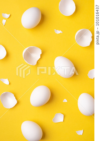 White Easter eggs and shells on a bright yellow background. White Easter eggs and shells on a bright yellow background. 101016437