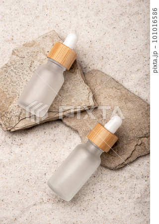 Glass bottles with a cosmetic product. Glass bottles with a cosmetic product. 101016586