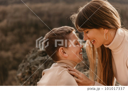 Mother and Son Together Laughing Face to Face Mother and Son Together Laughing Face to Face 101017337