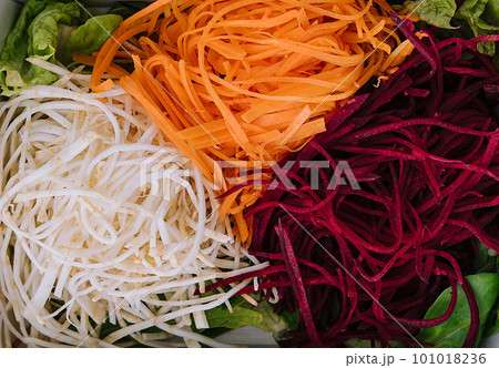 Slice fresh vegetables on the white plate 101018236