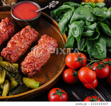 Meat rolls mititei or mici traditional romanian food Meat rolls mititei or mici traditional romanian food 101018307