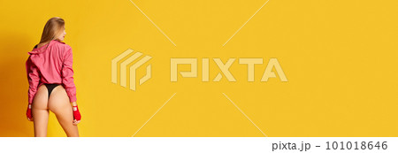 Banner with one attractive girl wearing body and bandages for boxing over yellow background. Copy space for ad Banner with one attractive girl wearing body and bandages for boxing over yellow background. Copy space for ad 101018646