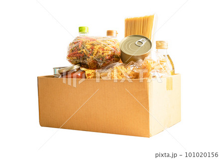 Foodstuff for donation isolated on white background with clipping path, storage and delivery. Various food, pasta, cooking oil and canned food in cardboard box. Foodstuff for donation isolated on white background with clipping path, storage and delivery. Various food, pasta, cooking oil and canned food in cardboard box. 101020156
