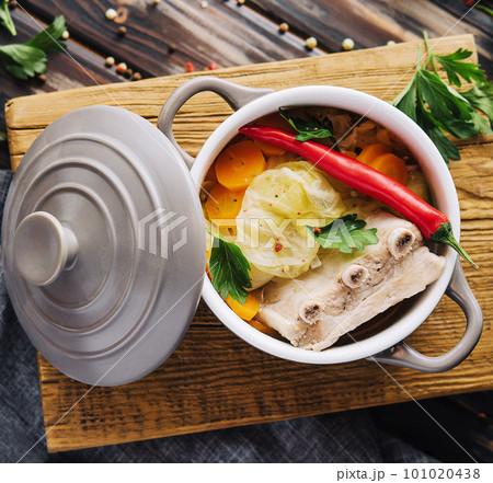 Pickled cabbage soup with carrots and pork ribs Pickled cabbage soup with carrots and pork ribs 101020438