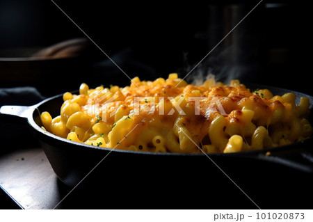 Mac and cheese. Classic American rustic mac and cheese. Golden baked macaroni with cheddar 101020873