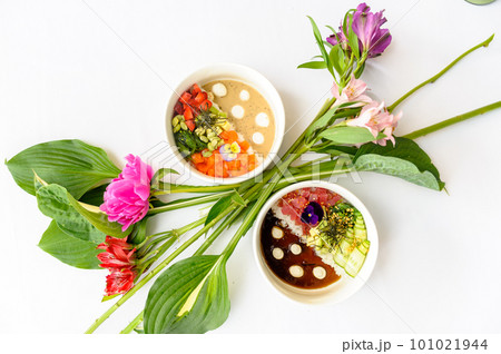 Two poke on a white background decorated with bright flowers 101021944