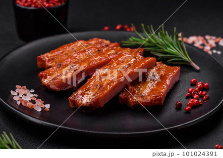 Grilled fresh juicy ribs with salt, spices and herbs Grilled fresh juicy ribs with salt, spices and herbs 101024391