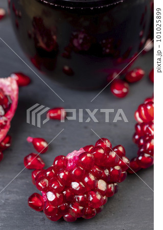 juicy pomegranate seeds of red color juicy pomegranate seeds of red color 101025899