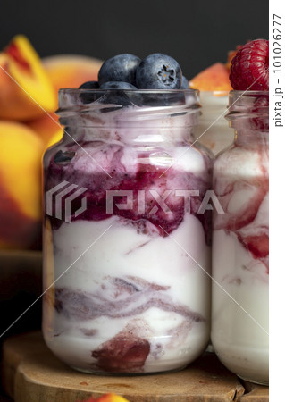 Fresh delicious yogurt made from milk with berry flavor 101026277