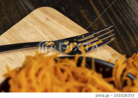 Orange carrots pickled with hot spices 101026355