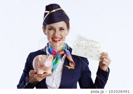 smiling modern female flight attendant on white 101026491