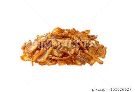 Heap roasted shallot onions isolated on white background. Pile of fried gold onion. 101026627