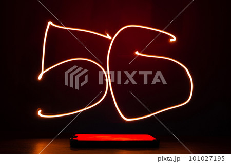 Abstract red lines long exposure light shape of 5G. Network internet mobile wireless Innovations in the future 5G cellular and Internet speeds. Abstract red lines long exposure light shape of 5G. Network internet mobile wireless Innovations in the future 5G cellular and Internet speeds. 101027195