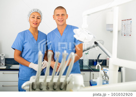 Dentist with assistant at the dental office Dentist with assistant at the dental office 101032920