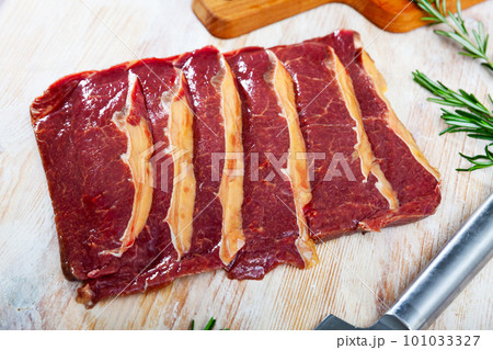 Sliced raw horse meat fillet Sliced raw horse meat fillet 101033327