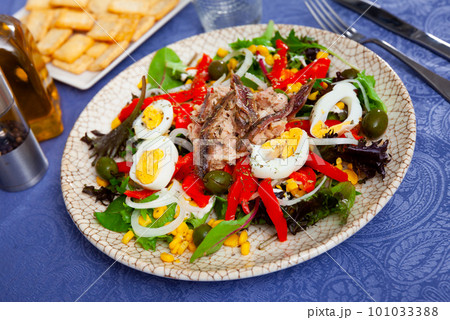 Xato salad with cod, chopped eggs and corn 101033388