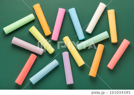 multicolor chalks like background over green multicolor chalks like background over green 101034395