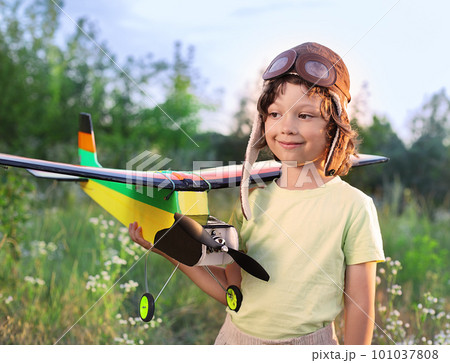 children with airplan toy outdoors children with airplan toy outdoors 101037808