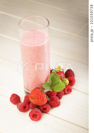 smoothie of berries on the table in the garden 101039738