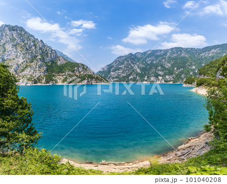 Wide angle view of Piva lake or Pivske Jezero in Montenegro at summer noon 101040208