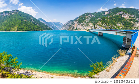 Wide angle view of Piva lake or Pivske Jezero in Montenegro at summer noon 101040211