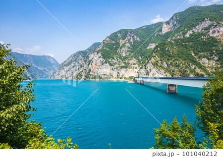 Wide angle view of Piva lake or Pivske Jezero in Montenegro at summer noon 101040212